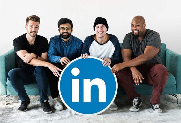 People holding a Linkedin logo