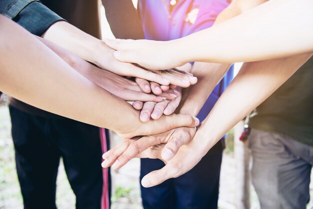 Free Photo people join hand together during their work - human commitment concept