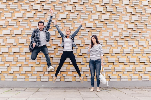 Free photo people jumping on street