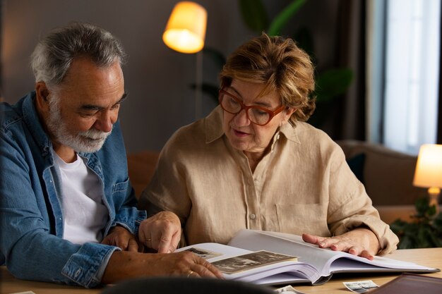 people looking over picture album