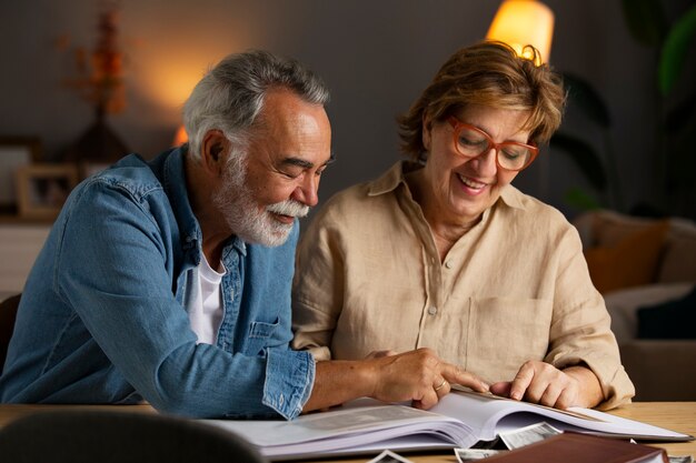 people looking over picture album