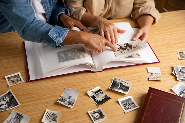 People looking over picture album