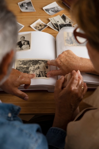 People looking over picture album