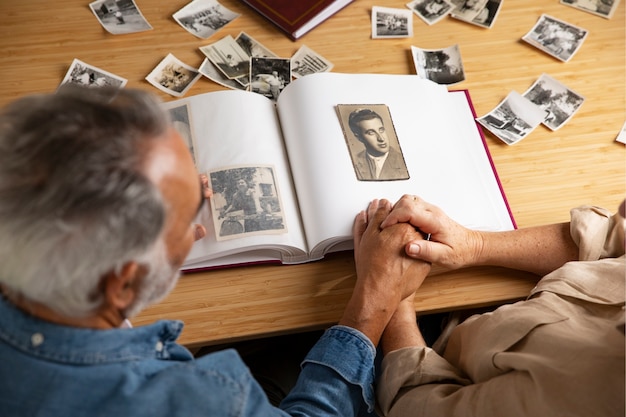 People looking over picture album