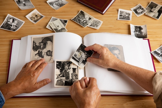 People looking over picture album