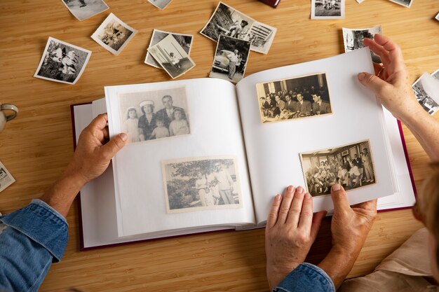 people looking over picture album