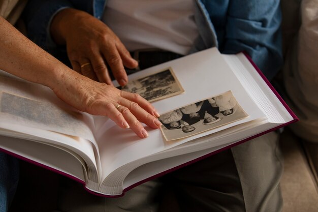 people looking over picture album