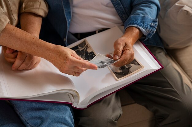 People looking over picture album