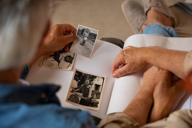 People looking over picture album