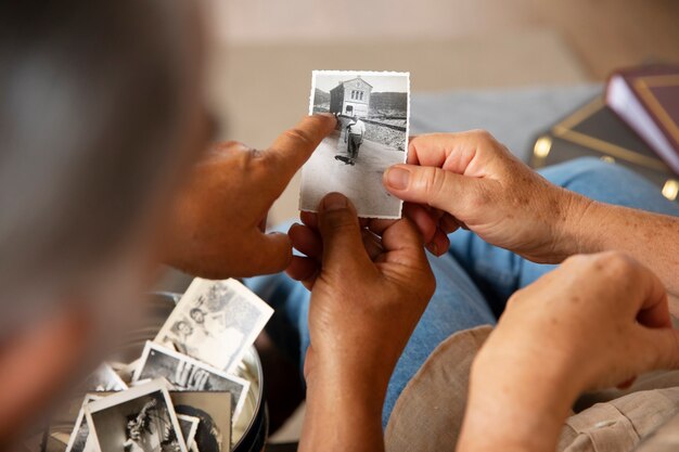 People looking over picture album