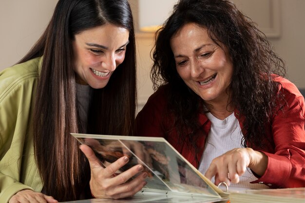 People looking over picture albums