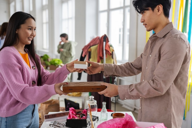 Free photo people meeting at a barter event to exchange goods