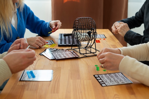 Free photo people playing bingo close up