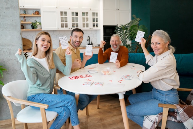 Free photo people playing bingo together