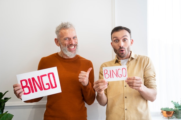 Free photo people playing bingo together