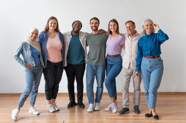 Free photo people posing together on registration day