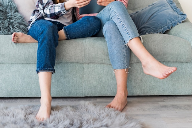 Free photo people relaxing on couch