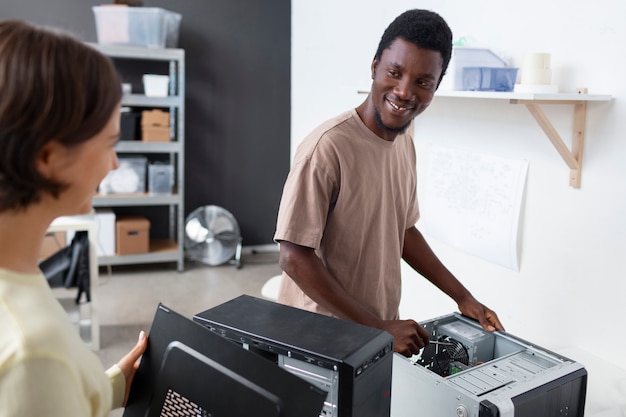 Free photo people repairing computer chips