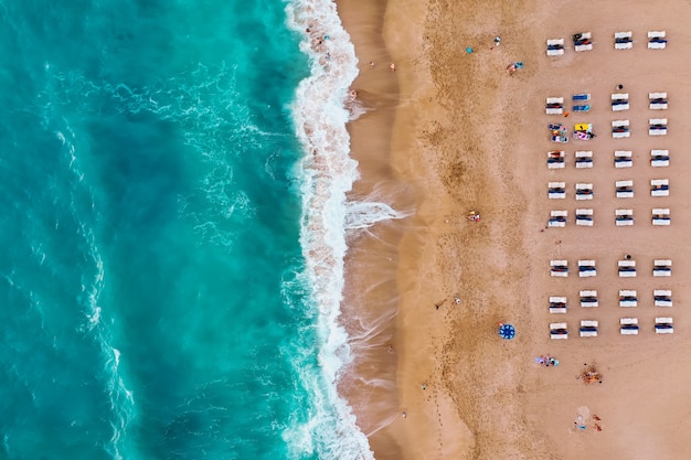 People resting on beach enjoy summer vacation