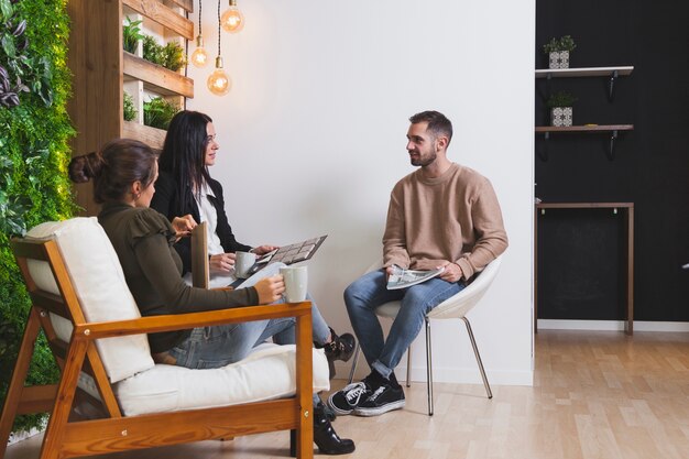 People resting in office together