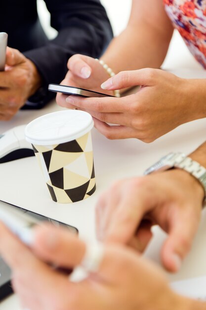 People's hands with gadgets