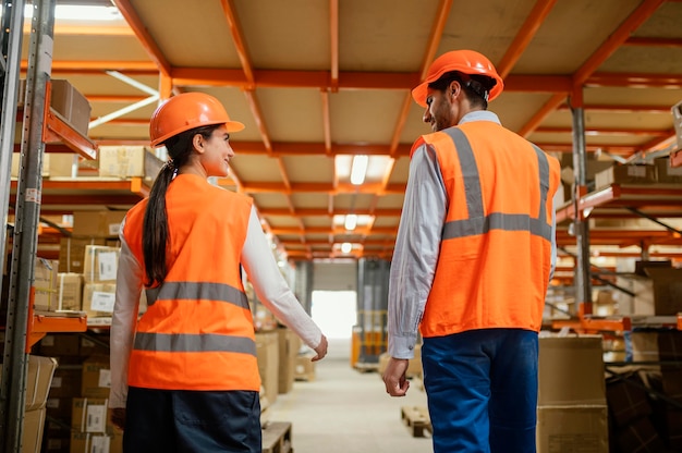 People in safety equipment at work