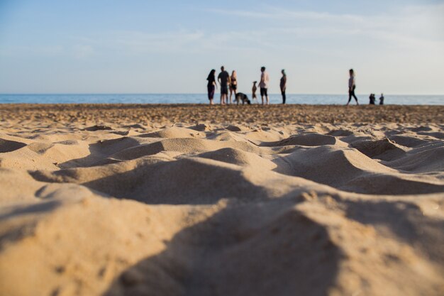 people on sand