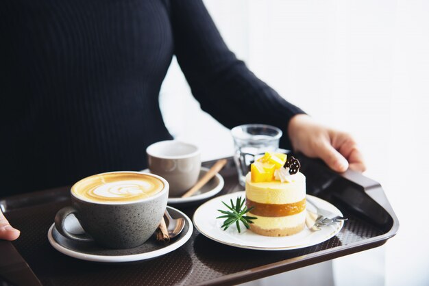 People serve beautiful fresh relax morning coffee cup set 