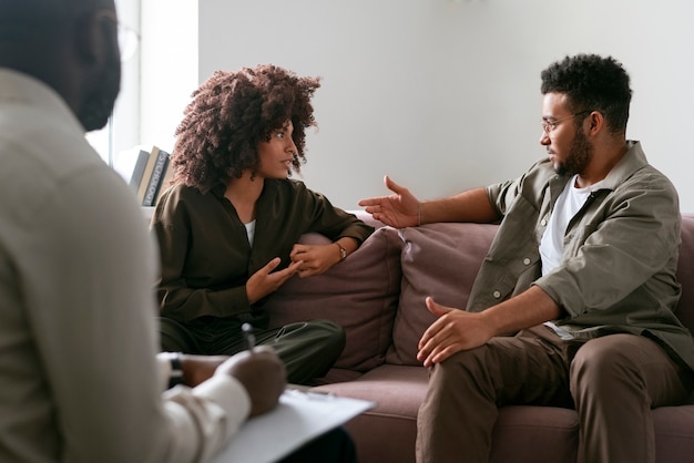 People sharing feelings and emotions during group therapy session