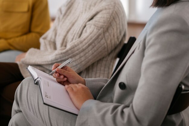 People sharing feelings and emotions during group therapy session