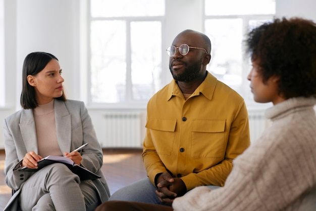 People sharing feelings and emotions during group therapy session