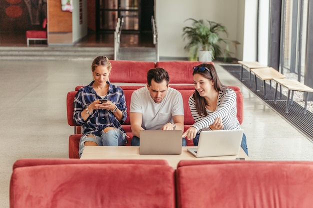 People sitting with gadgets