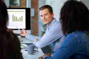 Free photo people smiling while in conference room