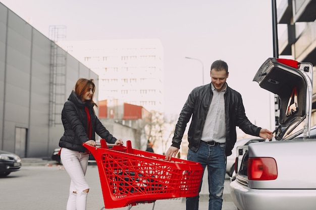 People standing by the trunk