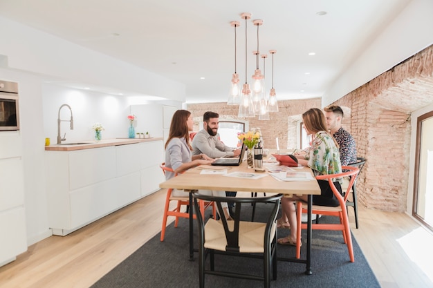 People at table working together