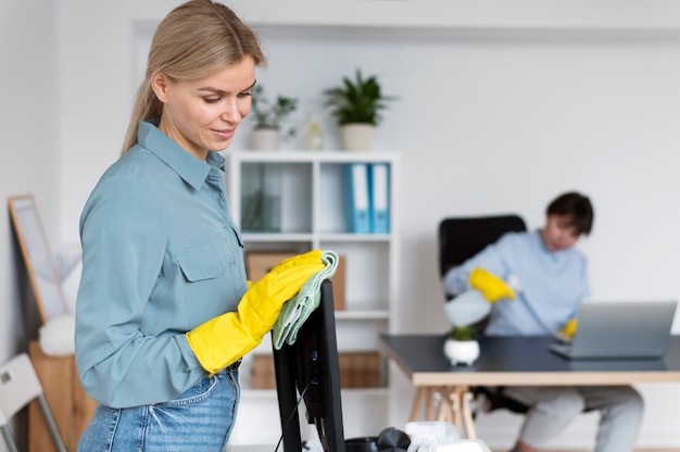 People taking care of office cleaning