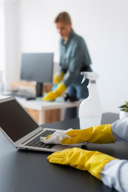 People taking care of office cleaning