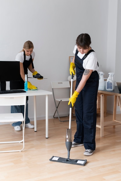 People taking care of office cleaning