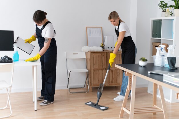 People taking care of office cleaning