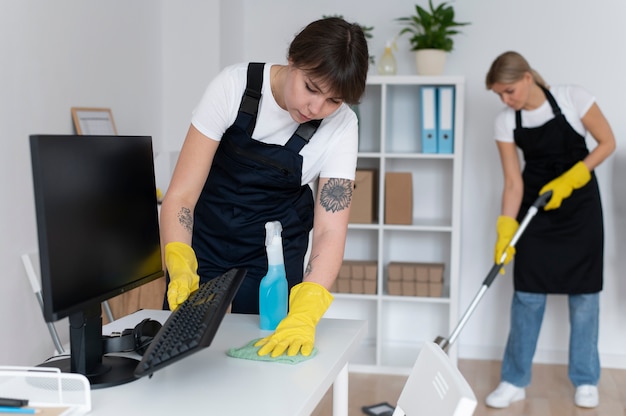 People taking care of office cleaning