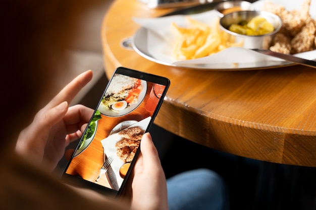 People taking photos of food