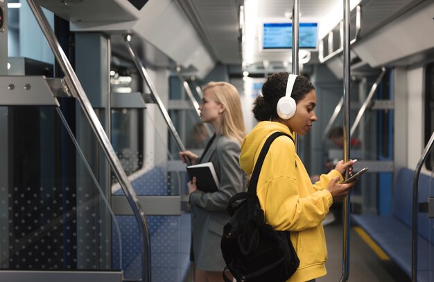 People traveling on the subway in winter time