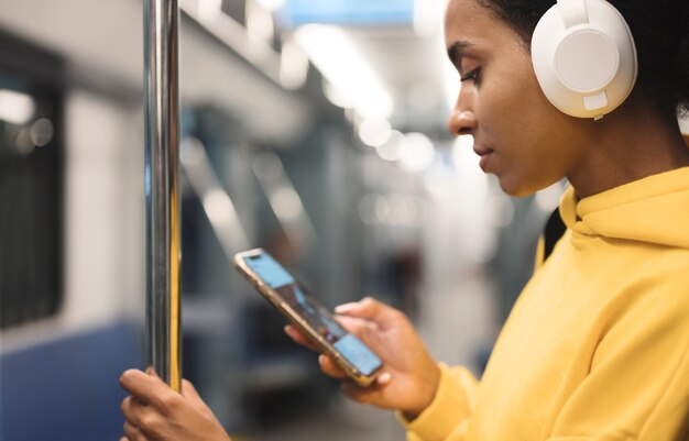 people traveling on the subway in winter time