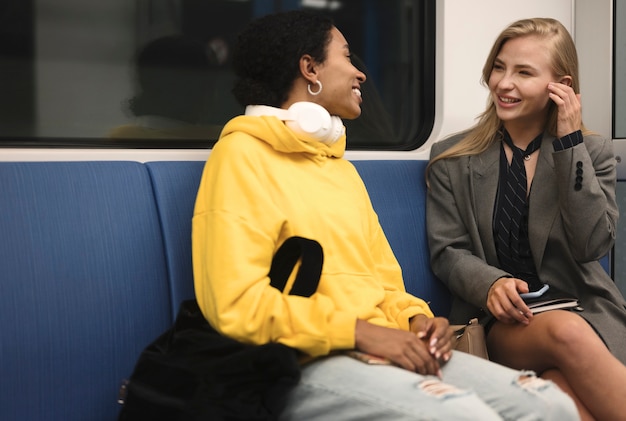 Free photo people traveling on the subway in winter time