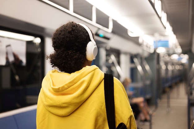 Free photo people traveling on the subway in winter time