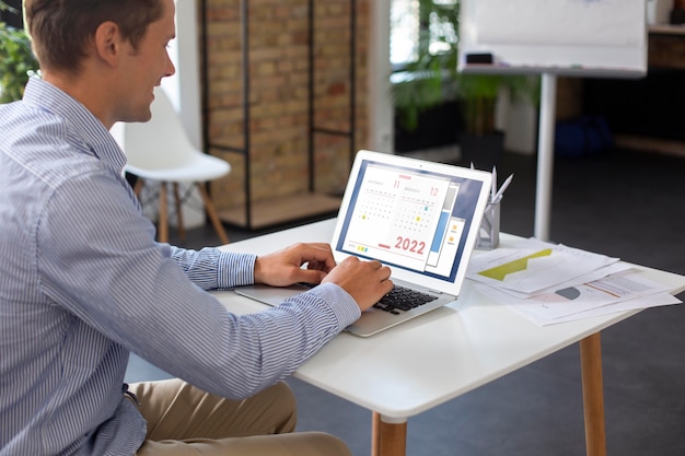 People using digital device while in a meeting