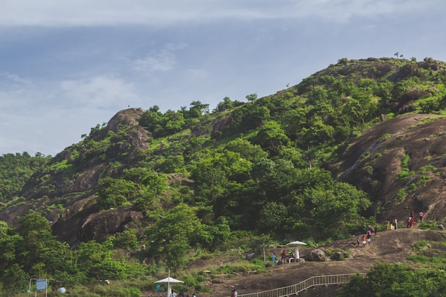 People walking up a hill