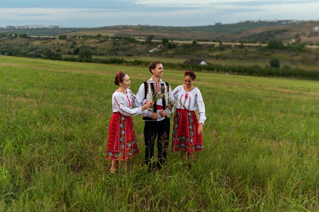 People wearing traditional clothes full shot