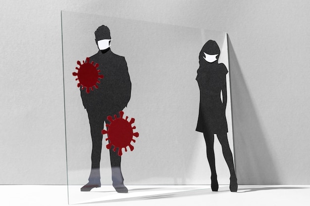 People with medical masks and glass divider for coronavirus safety