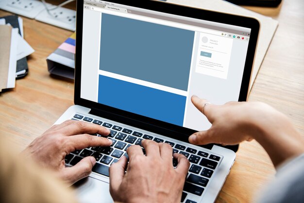 People working on a laptop in a meeting